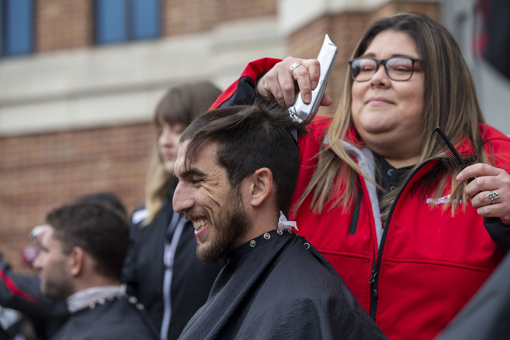 A&M baseball head shaving for cancer
